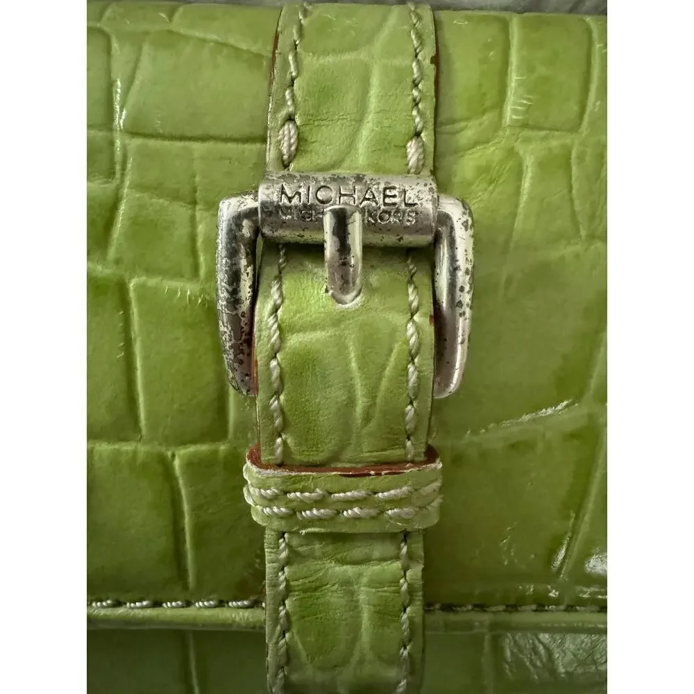 Michael Kors “Natasha” croc embossed leather wallet.